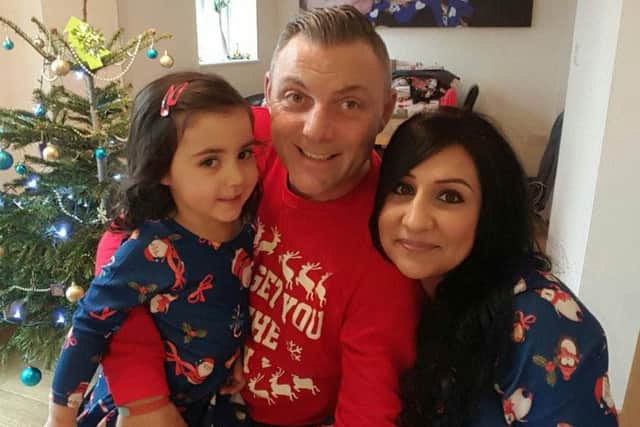 Jessica Adams, 3, with dad Jamie and mum Seema.