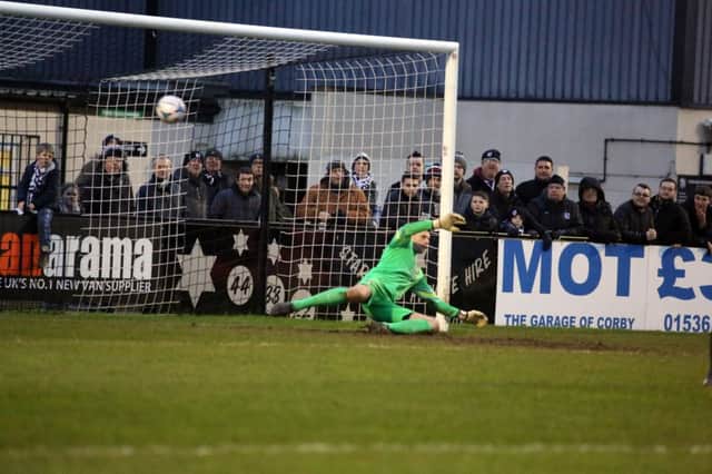 Greg Mills scores from the penalty spot but it was only a consolation as Corby Town lost 2-1 to Gainsborough Trinity at Steel Park. Pictures by Alison Bagley