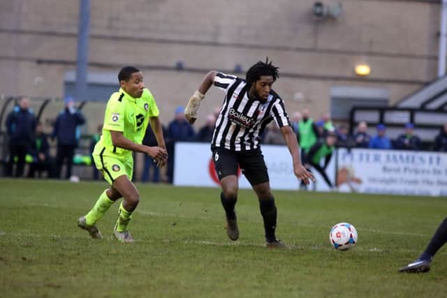 Anton Brown gets on the ball for Corby during the loss to Gainsborough