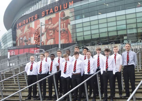 Kettering Town's under-16 squad outside the Emirates Stadium ahead of their big win over Arsenal last weekend