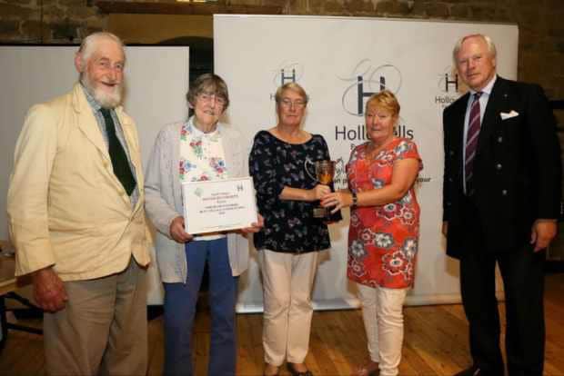 Rothersthorpe  Winner of Small Villages cup and overall 2015 Best Village Competition Third place. Photo shows Rothersthorpe villagers Philip Dickens, Lindsey Moss, Barbara Walsh & Helen Teden receiving the Small Villages cup from David Laing.