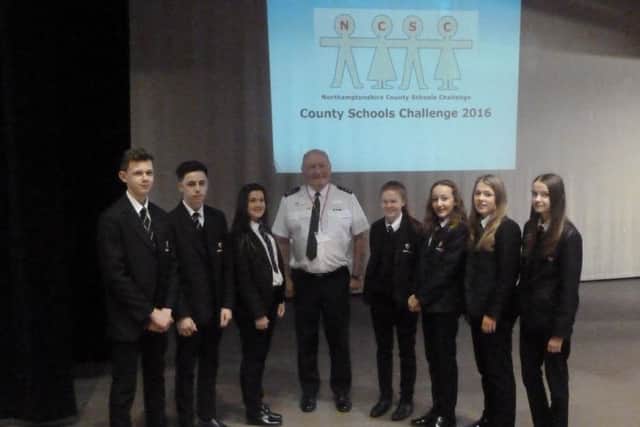 Shaun Johnson from the arson task force with students from Latimer Arts College