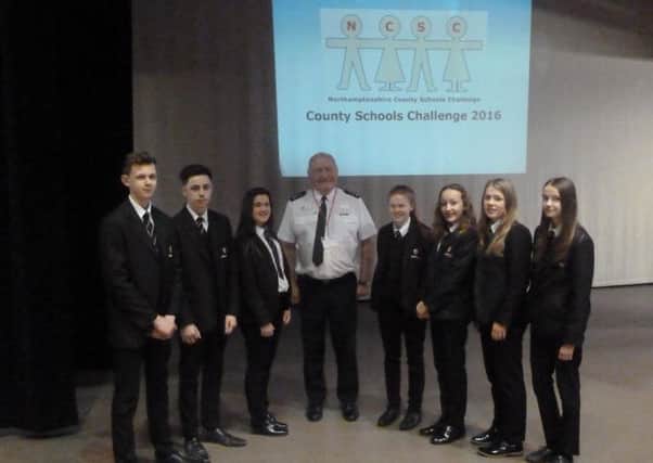 Shaun Johnson from the arson task force with students from Latimer Arts College