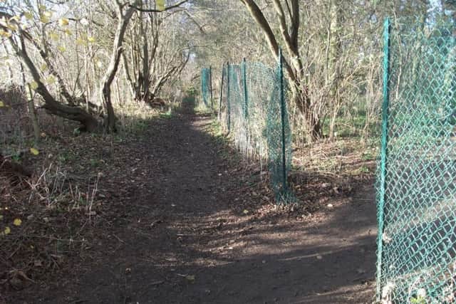 A group of litter pickers have slammed Kettering Council for their decision to allow the building of nine "biologically dead" houses on a site adjacent to a wildlife reserve.
