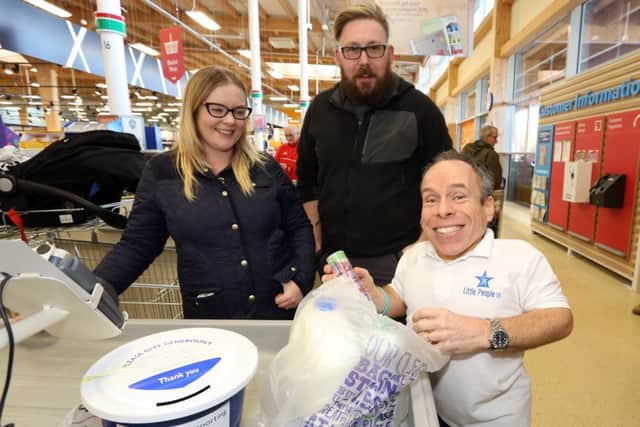 Warwick helps out with some bag-packing at the Corby store
