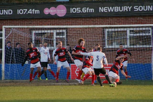 Action from Kettering Town's 2-1 defeat at Hungerford Town on Saturday. Pictures by Peter Short