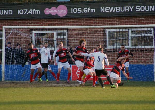 Action from Kettering Town's 2-1 defeat at Hungerford Town on Saturday. Pictures by Peter Short