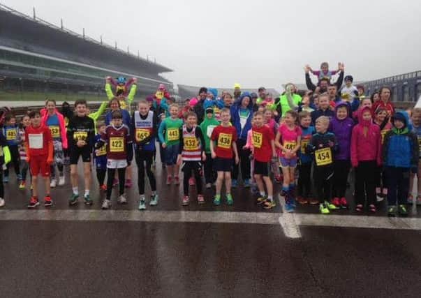 The Brass Monkeys run at Rockingham Speedway for Corby's Lakelands Hospice