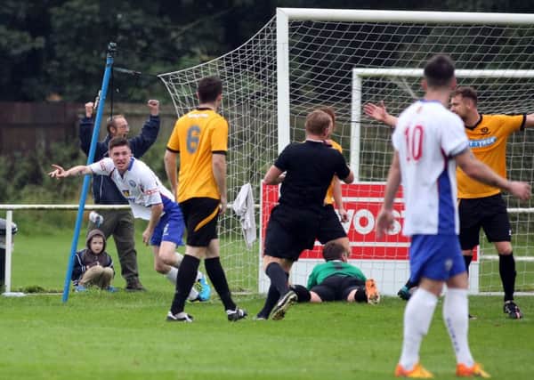 Dan Quigley, pictured celebrating after scoring in the 2-0 home win over Bedford Town in August, has returned to AFC Rushden & Diamonds