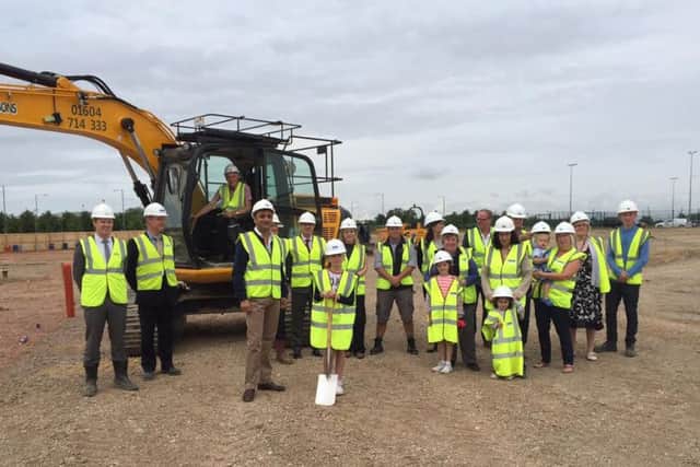 The sod-cutting for the new school last year