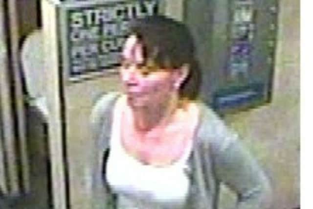 Police want to question a woman caught on CCTV in connection with a theft at the Boston Clipper pub in College Street, Northampton.