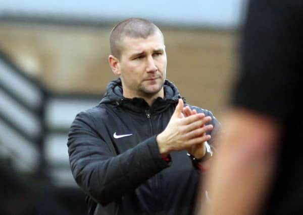 Tommy Wright and Corby Town head to Bradford Park Avenue tomorrow as they continue their bid for survival in the Vanarama National League North