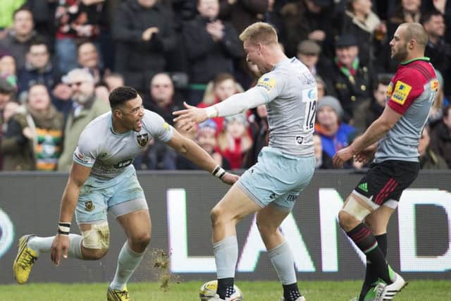 Luther Burrell celebrates scoring his try for Saints against Harlequins (Pictures: Kirsty Edmonds)