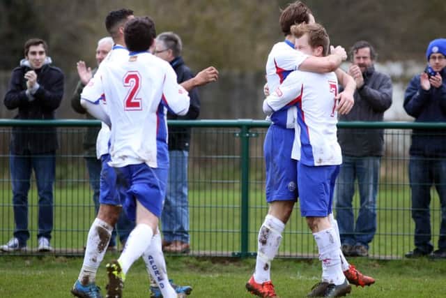 AFC Rushden & Diamonds' players celebrate Andy Hall's goal during the 3-0 home success against Ware