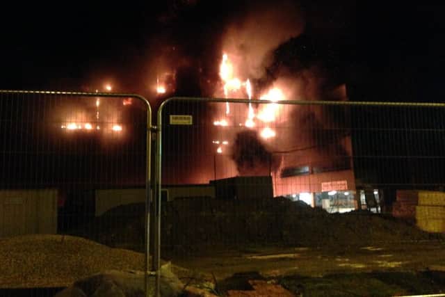 Three teenage boys are to appear in court charged with causing a fire which tore through a Corby shopping centre car park