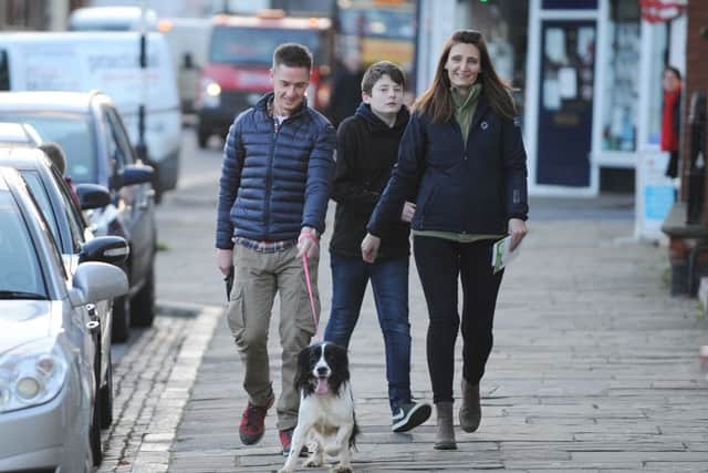 Bella back on the streets in Rothwell with Phil Osborne, Joseph Luckman, 13, and Sarah Osborne