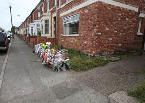 Flowers left in Charles Street, Kettering, after fatal accident on Tuesday, June 23, 2015 NNL-150625-144808001