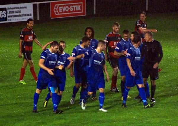 Chippenham Town celebrate one of their goals during their 2-1 win at Latimer Park earlier this season. Kettering Town make the trip to take on the second-placed side again tomorrow