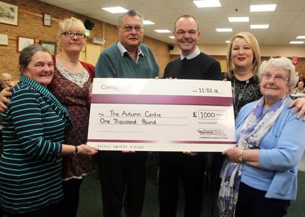 The Cambridge Weight Plan Tracey Calterwood and Kevin Gates present Trustees of the Autumn Centre Marie Bissett, Maria Difolco (Centre Supervisor), Navin Bhatia and Jessie Lyons with a cheque for Â£1000 NNL-161102-124500009