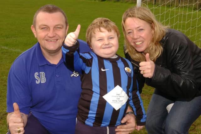 Jay Brewer with his parents Stephen and Sharon