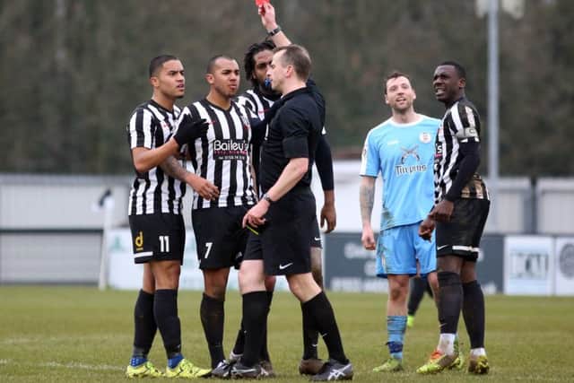 Corby Town debutant Nathan Hicks is shown a red card for a second bookable offence during the 2-0 win over Tamworth
