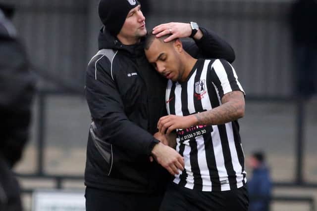 Corby Town boss Tommy Wright congratulates goalscorer Greg Mills after the Steelmen completed a 2-0 win over Tamworth. Pictures by Alison Bagley