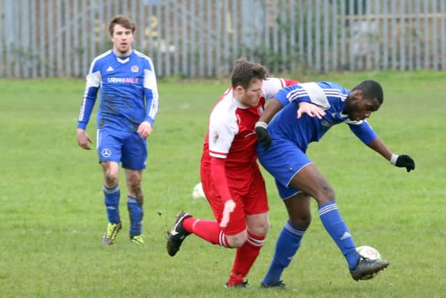 Action from Thrapston Town's 1-1 draw with Woodford United at Chancery Lane. Pictures by Alison Bagley