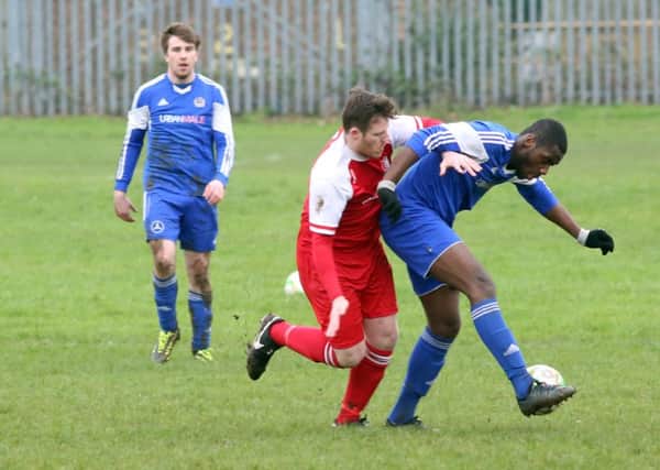 Action from Thrapston Town's 1-1 draw with Woodford United at Chancery Lane. Pictures by Alison Bagley