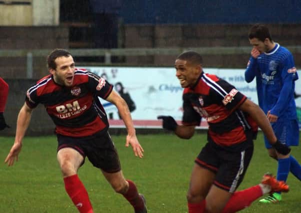 Wilson Carvalho shows his delight after scoring Kettering Town's second goal in the fine 2-0 success at Chippenham Town. Pictures by Peter Short