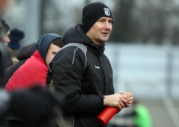 Tommy Wright was able to afford a smile again on Saturday as his Corby Town side claimed a much-needed win over Tamworth. Picture by Alison Bagley