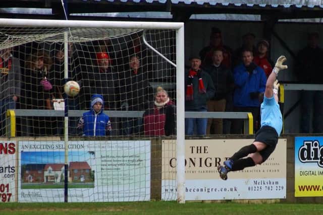 Spencer Weir-Daley's shot flies into the net as he gave Kettering Town an early lead on his debut