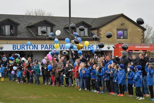 Balloons were released at the game in memory of Jay Brewer