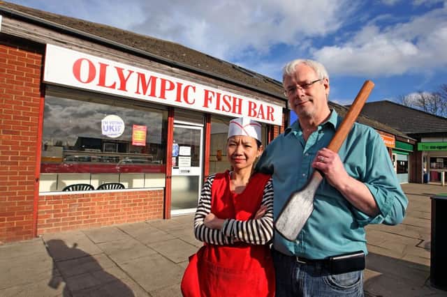 Olympic Fish Bar owners Kam Fung Tsang and husband Ray Critchlow fought off two robbers with a curry paddle called 'Woody'. NNL-140221-150221009