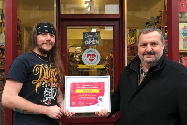 Neil Waite (left) and John Cable with the award