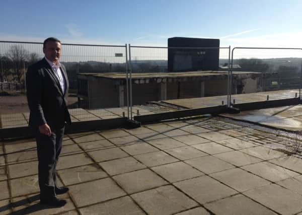 Corby town centre manager Dan Pickard overlooking the former bus station site in Corby town centre
