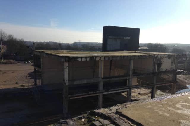 The part-demolished Corby bus station