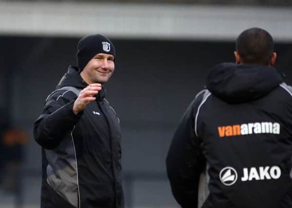 Tommy Wright is pleased with the characters he has in the Corby Town dressing-room
