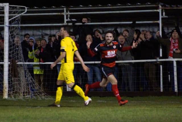 Will Grocott celebrates opening the scoring in Kettering Town's 3-0 win over Dorchester Town. Picture by Peter Short
