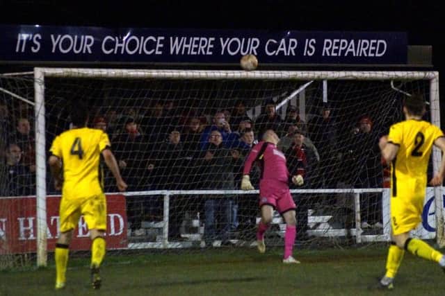 Spencer Weir-Daley's effort drifts over Dorchester goalkeeper Shaun Murphy during the midweek clash at Latimer Park