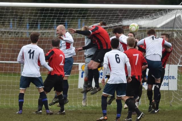 Action from the 2-2 draw between ON Chenecks and Raunds Town last weekend