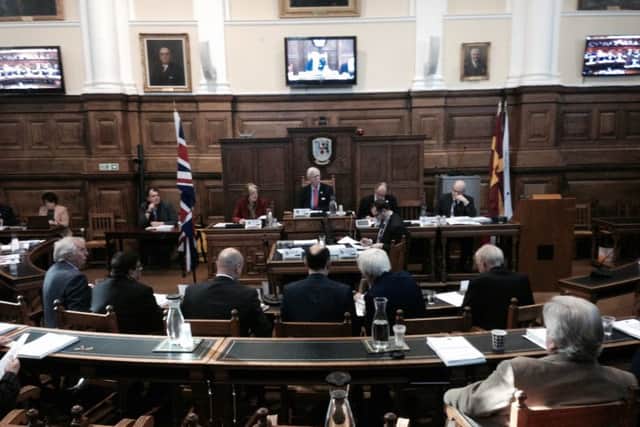 The Conservative cabinet at County Hall. The authority, which is preparing to cut Â£65  million from its budget, has spent more than Â£46 million on expensive agency staff since 2014.
