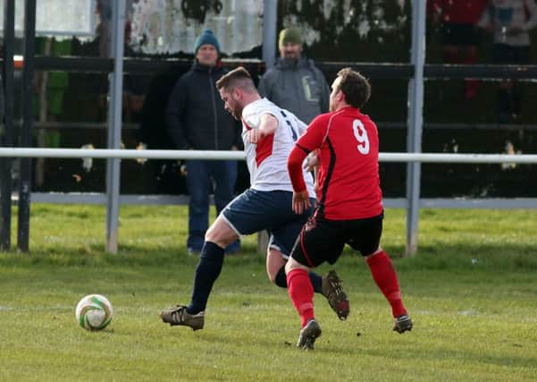 Action from Stewarts & Lloyds' 2-1 home defeat to ON Chenecks in Division One. Pictures by Alison Bagley