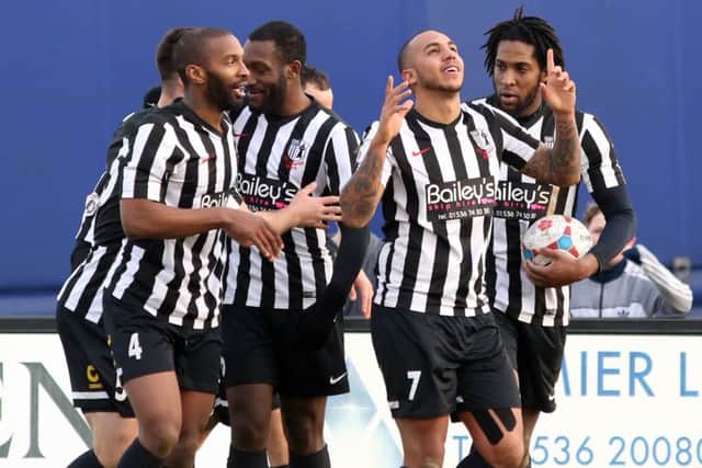 Greg Mills celebrates after scoring Corby Town's equaliser during the 3-1 defeat to Nuneaton Town at Steel Park. Pictures by Alison Bagley