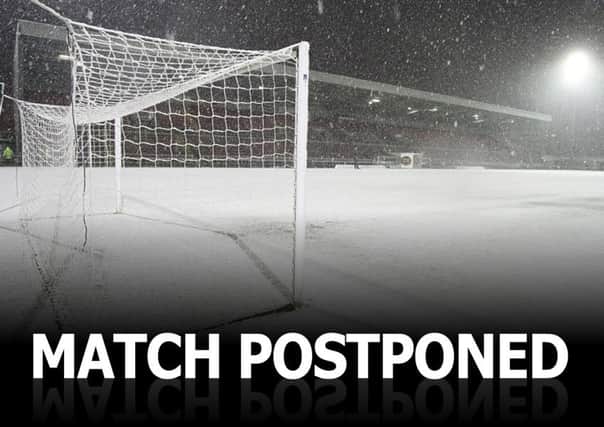 Corby Town's clash at Bradford Park Avenue has been called off following heavy snow in the area