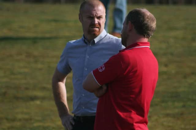 Burnley boss Sean Dyche has been offering his mate Andy Peaks a few 'words of wisdom' ahead of AFC Rushden & Diamonds' run-in
