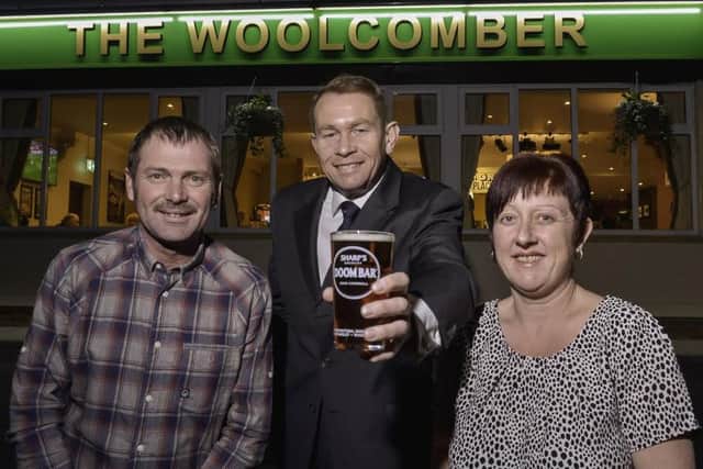 Publicans of The Woolcomber Stuart and Donna Rebhan with Kettering MP Philip Hollobone