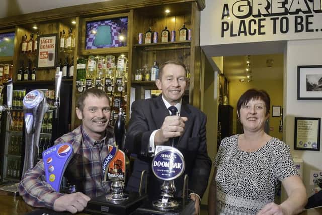 Behind the bar at the newly refurbished Woolcomber pub in Kettering