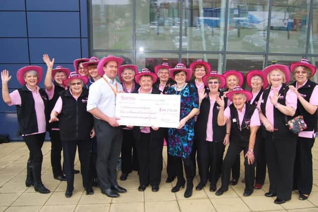 Consultant oncoplastic surgeons at Kettering Hospital Gavin Wilson & Alexandra Knight with the Crazy Hats team