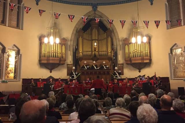 The Royal Marines Band performing in Wellingborough