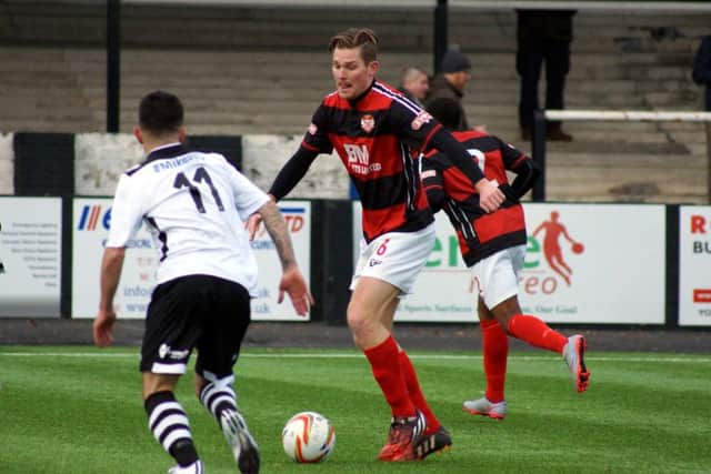 Elliot Sandy has been released by Kettering Town